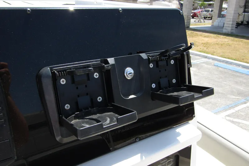Slide: The Image of 2022 Skeeter SX2550 Fish boat console with dual cup holders. - 20