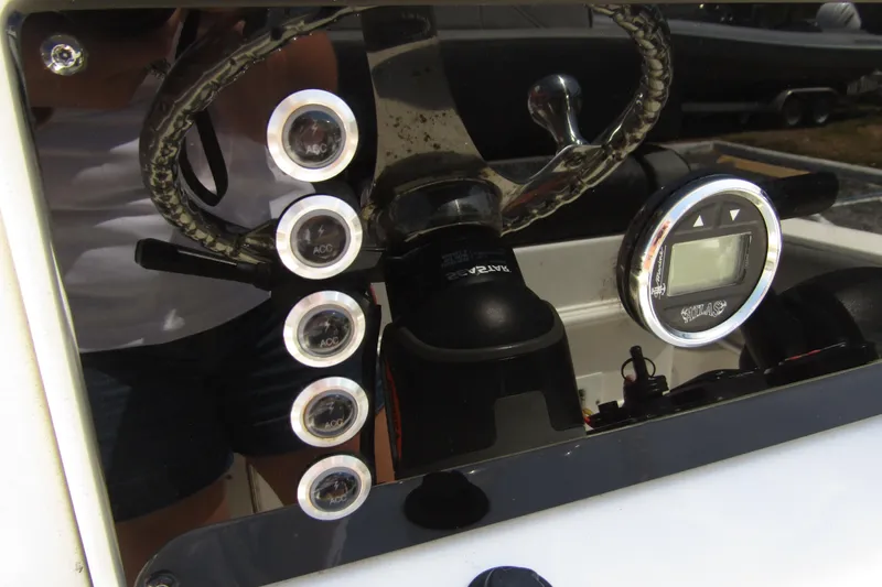 Slide: The Image of Dashboard of 2022 Skeeter SX2550 Fish boat with gauges and controls. - 21