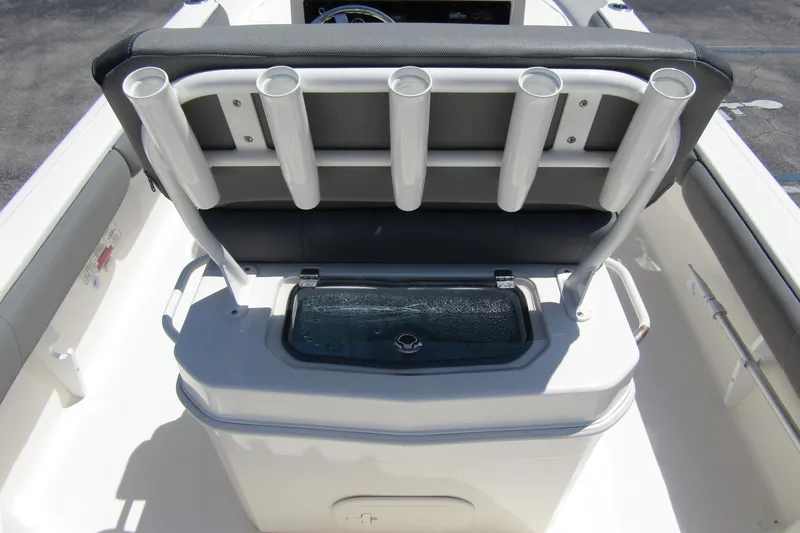 Slide: The Image of 2022 Skeeter SX2550 Fish boat with rod holders and livewell in the seating area. - 32