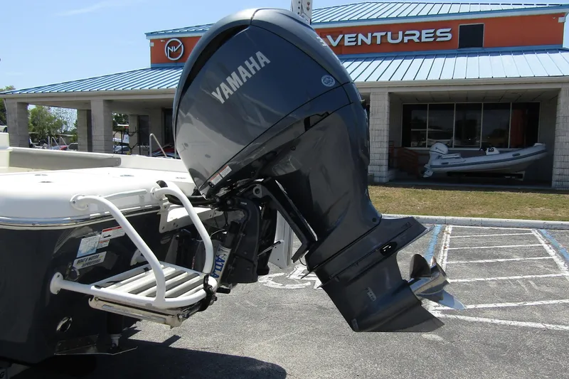 Slide: The Image of 2022 Skeeter SX2550 Fish boat with Yamaha outboard motor at dealership. - 7