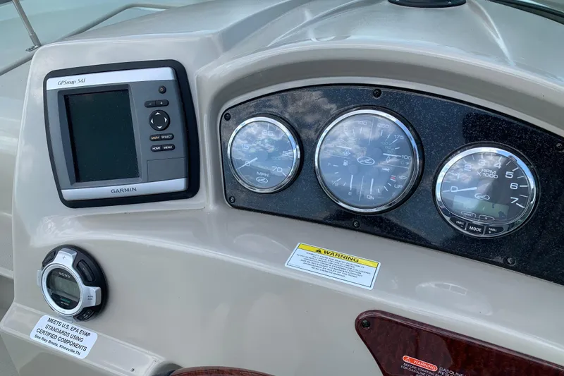 Slide: The Image of Dashboard of 2012 Sea Ray 240 Sundancer with Garmin GPS and gauges. - 9