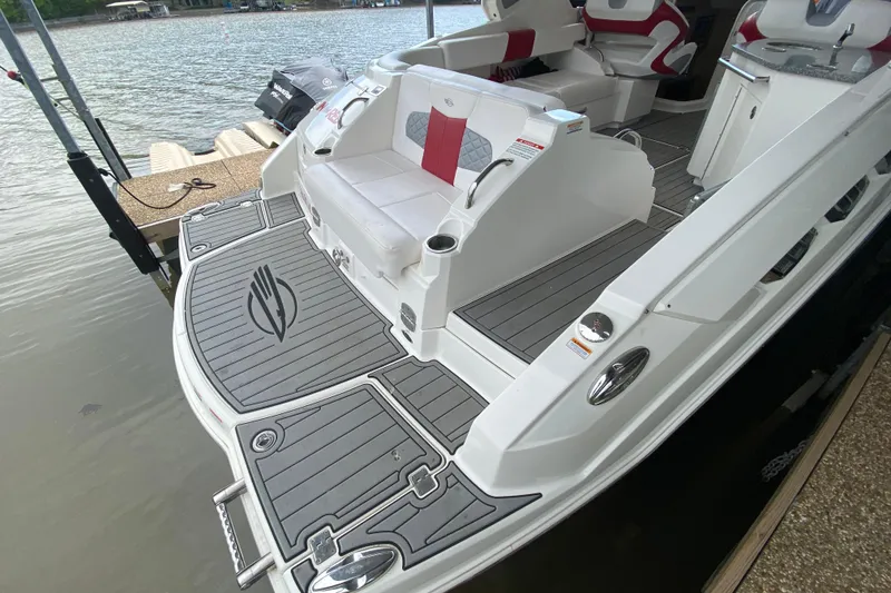 Slide: The Image of 2012 Chaparral 327 SSX boat with sleek deck design and comfortable seating. - 15