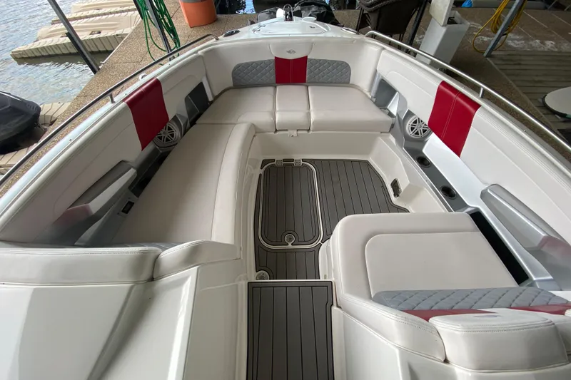 Slide: The Image of Luxurious interior of a 2012 Chaparral 327 SSX boat with spacious seating and elegant design. - 35