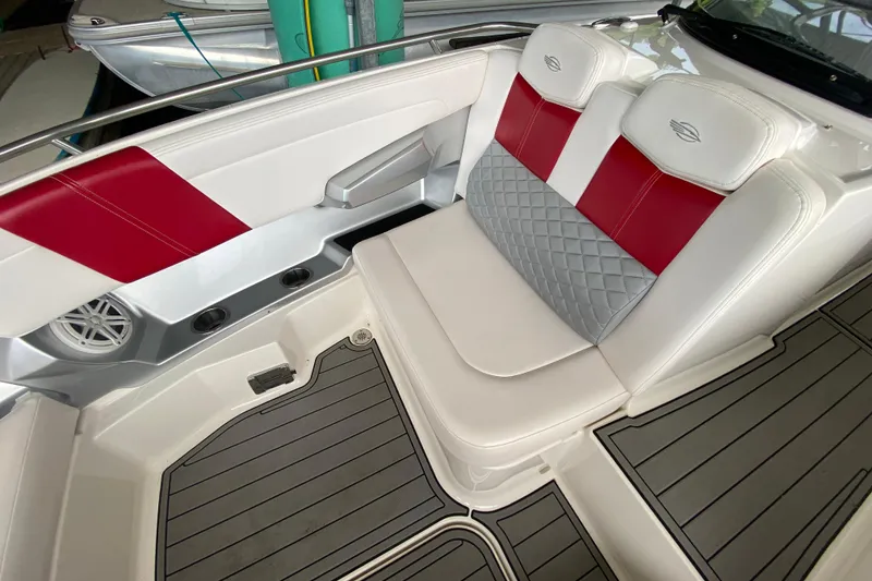 Slide: The Image of Interior of 2012 Chaparral 327 SSX boat with red and gray seating. - 37