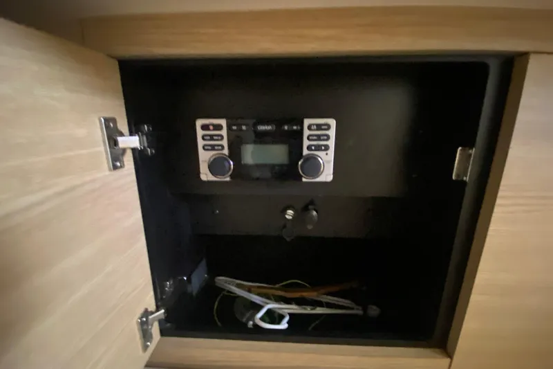 Slide: The Image of Open cabinet with stereo system inside Chaparral 327 SSX, 2012 model. - 45