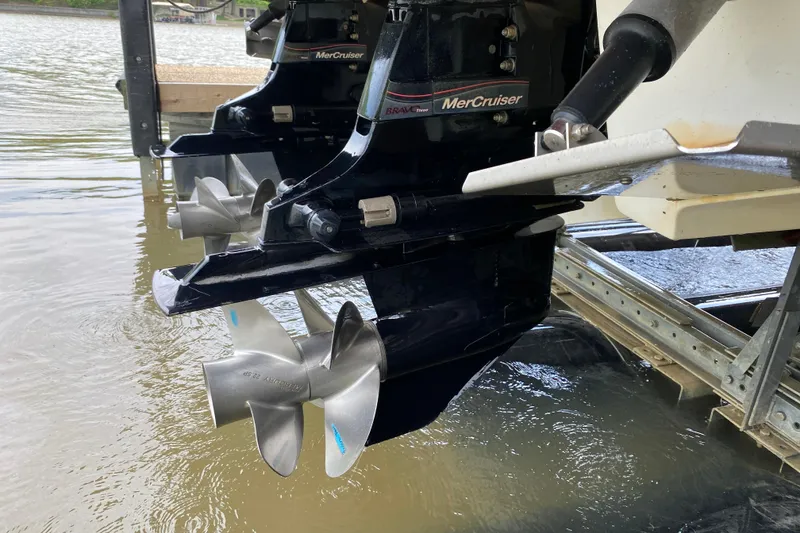 Slide: The Image of 2012 Chaparral 327 SSX boat with MerCruiser outdrive and stainless steel propellers. - 9
