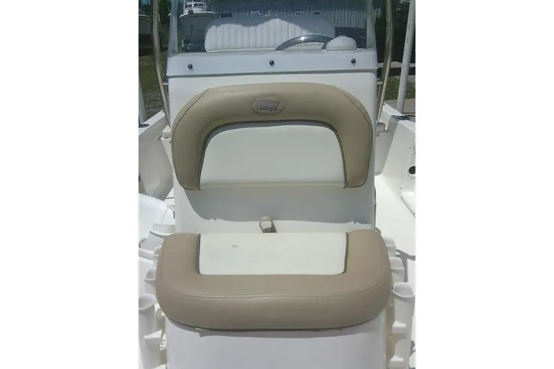 Slide: The Image of 2018 Key West 1720 Center Console boat seat with beige and white upholstery. - 15