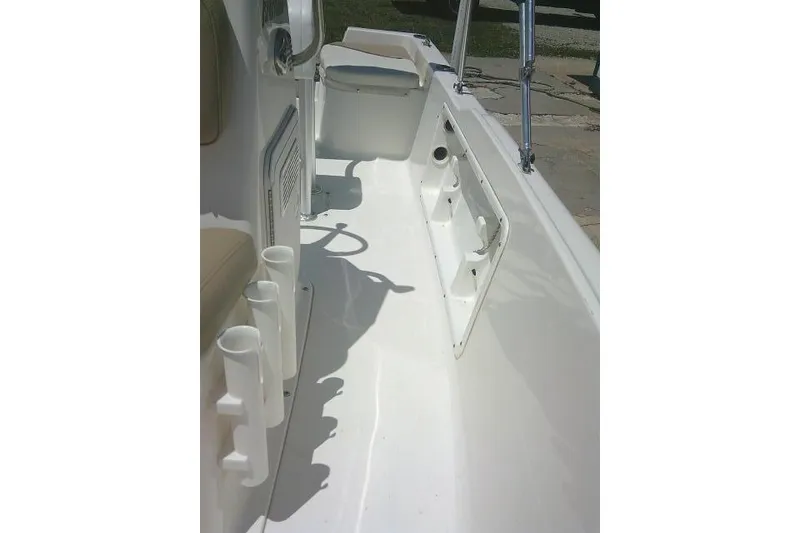 Slide: The Image of 2018 Key West 1720 Center Console boat interior with rod holders and seating. - 16