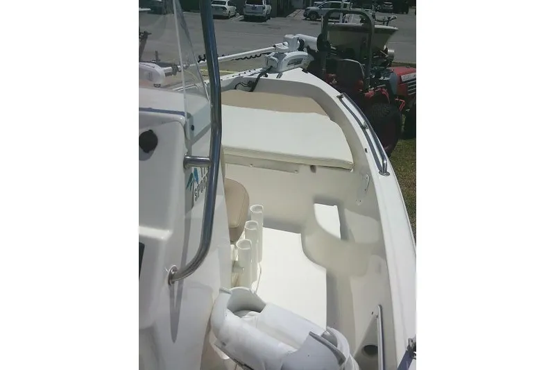 Slide: The Image of 2018 Key West 1720 Center Console boat interior with seating and console view. - 22