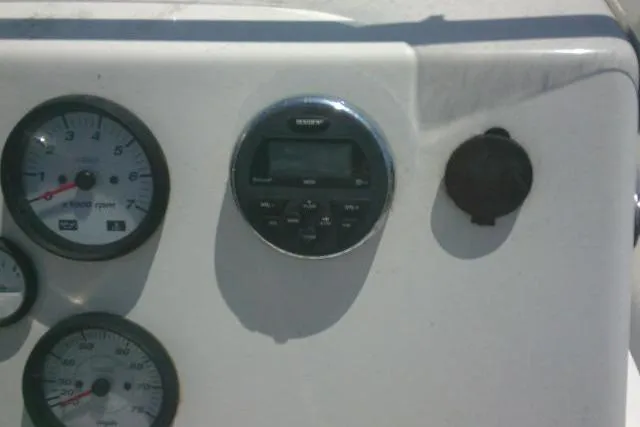 Slide: The Image of Dashboard of 2018 Key West 1720 Center Console boat with gauges and controls. - 24