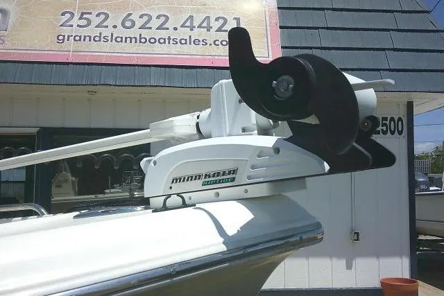 Slide: The Image of 2018 Key West 1720 Center Console with Minn Kota trolling motor at boat dealership. - 4
