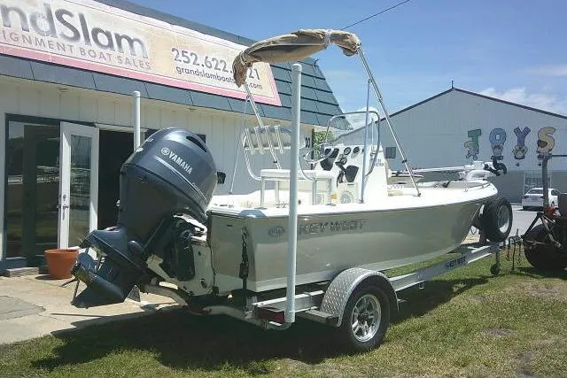 Slide: The Image of 2018 Key West 1720 Center Console boat with Yamaha engine on trailer outside dealership. - 8