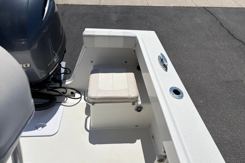 Slide: The Image of 2016 Parker 2100 Center Console boat with seating and motor detail. - 20
