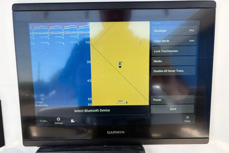 Slide: The Image of Garmin marine display on Parker 2100 Center Console, 2016 model, showing navigation and sonar settings. - 9