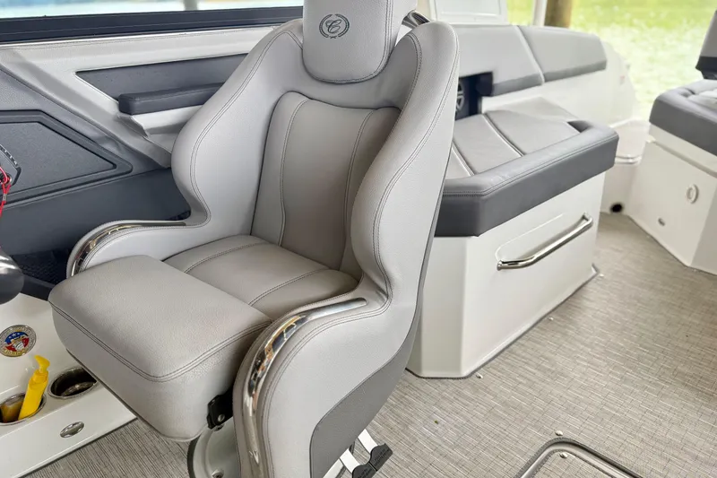 Slide: The Image of 2023 Cobalt R6 boat interior with luxurious gray seating and modern design. - 10