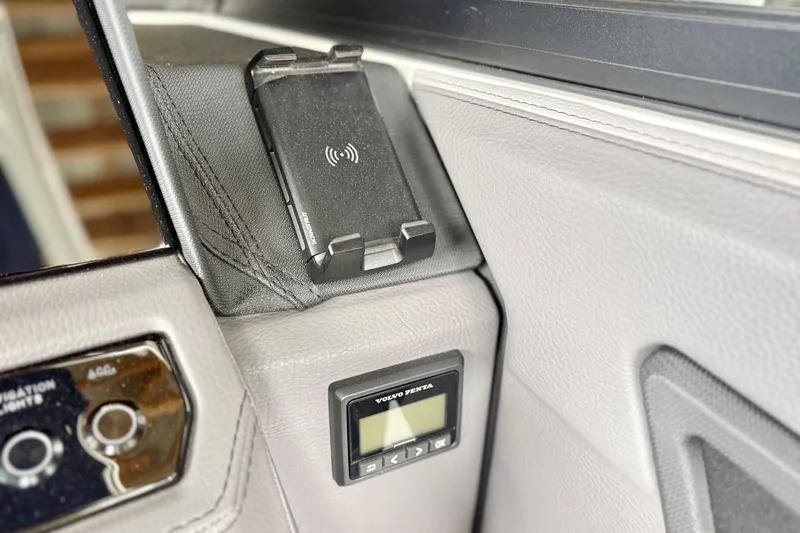 Slide: The Image of 2023 Cobalt R6 interior with wireless charger and Volvo Penta control panel. - 14