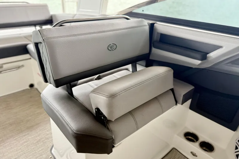 Slide: The Image of 2023 Cobalt R6 boat interior with luxurious seating and modern design. - 16