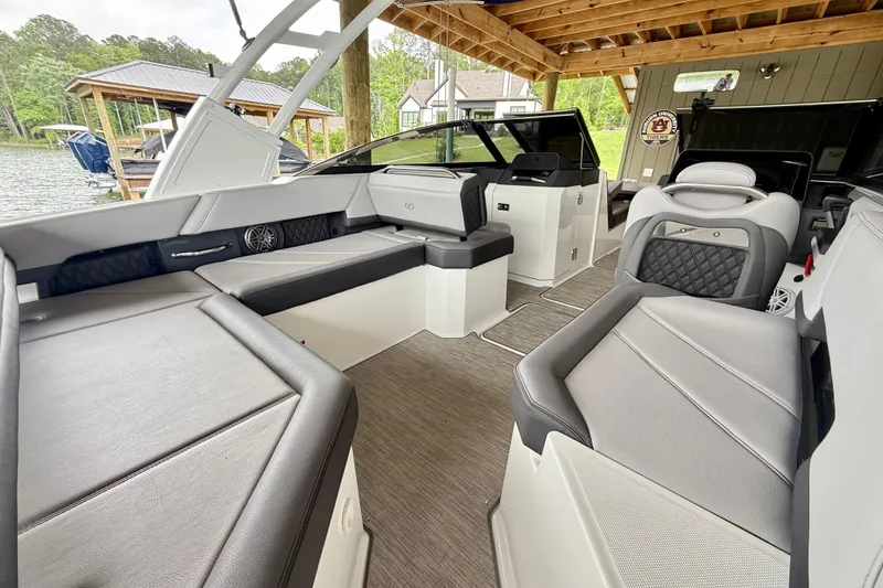 Slide: The Image of 2023 Cobalt R6 boat interior with luxurious seating and modern design. - 21