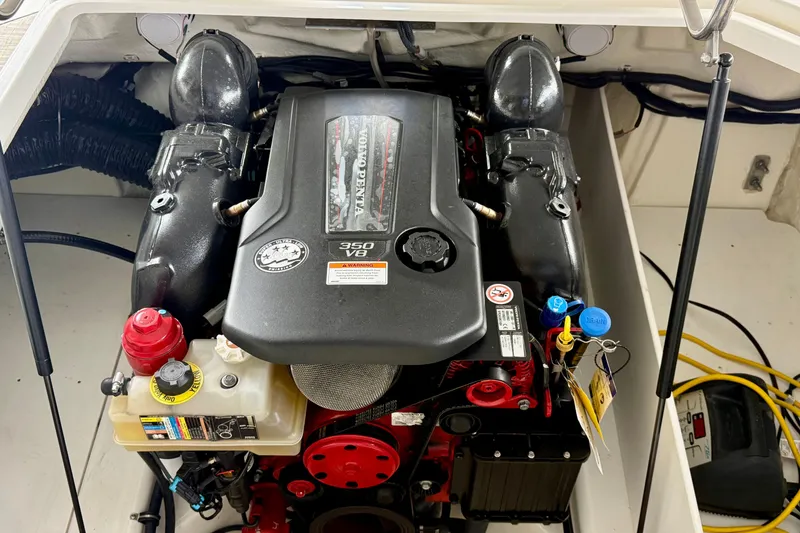 Slide: The Image of 2023 Cobalt R6 engine compartment featuring a Volvo Penta 350 V8 engine. - 22