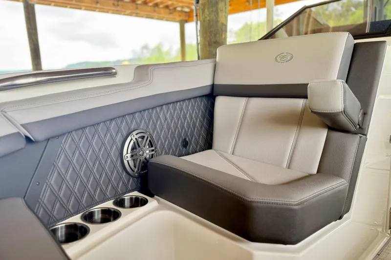 Slide: The Image of 2023 Cobalt R6 boat interior with luxurious seating and cup holders. - 7
