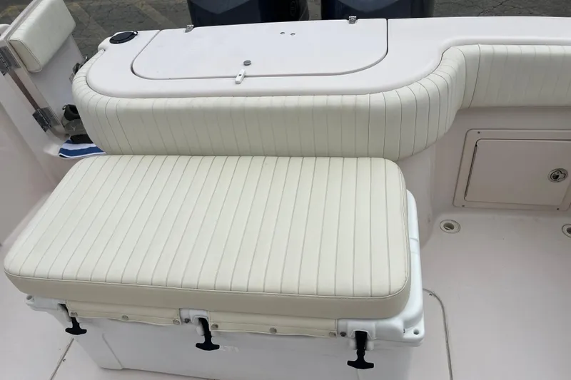 Slide: The Image of Cushioned seating and storage compartment - 10