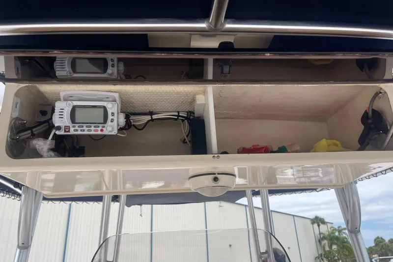 Slide: The Image of Overhead boat console with electronics and storage compartments - 6
