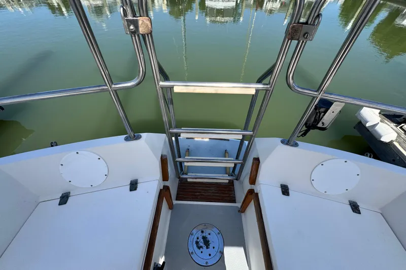 Slide: The Image of Cockpit view of a 1990 Catalina 42 MkII sailboat with stainless steel ladder. - 11