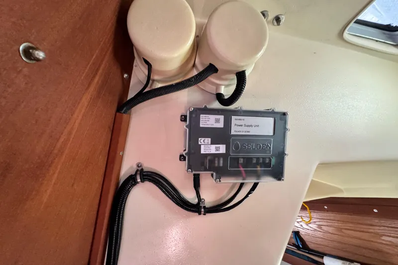 Slide: The Image of Power supply unit installation in 1990 Catalina 42 MkII sailboat interior. - 20