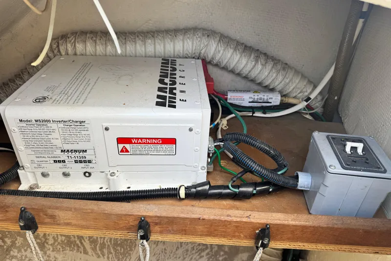 Slide: The Image of Inverter/charger setup in a 1990 Catalina 42 MkII sailboat. - 5