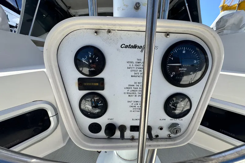 Slide: The Image of Control panel of a 1990 Catalina 42 MkII sailboat with gauges and switches. - 7