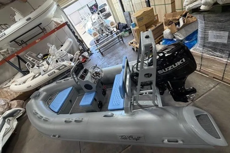 Slide: The Image of Grey and blue Catalina 13 boat by Tide Craft, 2026 model. - 0
