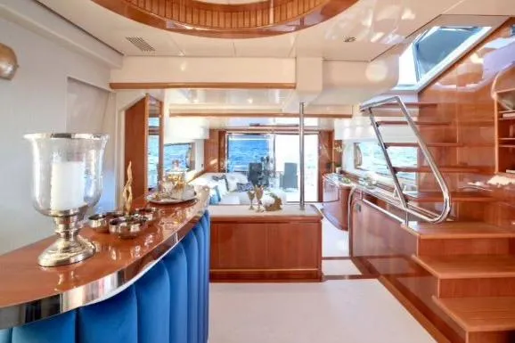 Slide: The Image of Luxurious interior of 2003 Gianetti 86 Motoryacht with elegant wood finishes and ocean view. - 6
