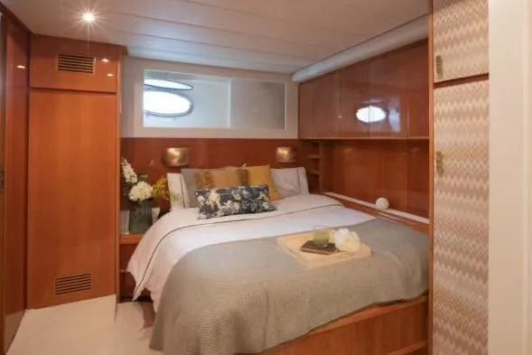 Slide: The Image of Luxurious bedroom interior of 2003 Gianetti 86 Motoryacht with elegant wood paneling. - 7