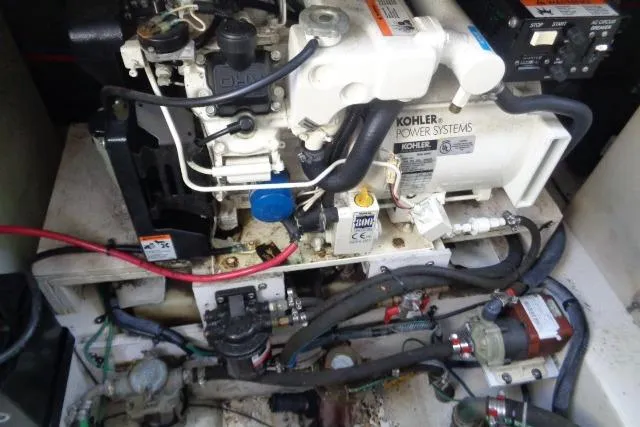 Slide: The Image of Engine compartment of a 2005 Sea Ray Sundancer 260 with Kohler power systems. - 24