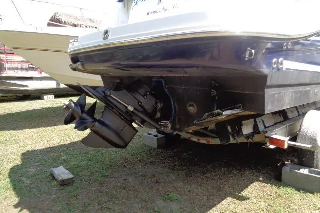 Slide: The Image of 2005 Sea Ray Sundancer 260 boat on trailer, showing stern and propeller. - 33