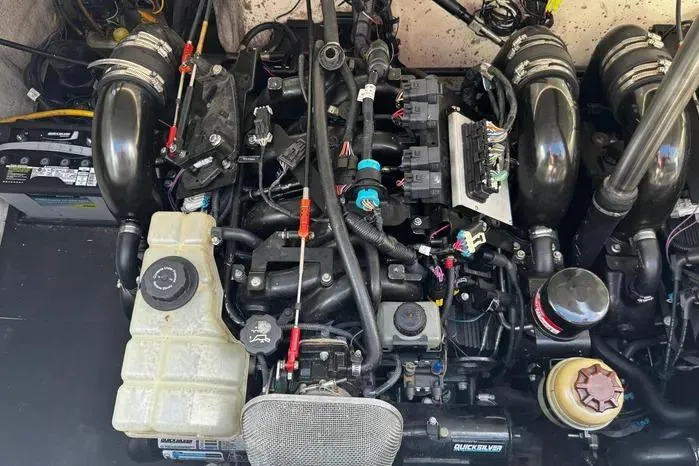 Slide: The Image of Engine of a 2005 Cobalt 360 Cruiser with visible components and wiring. - 23