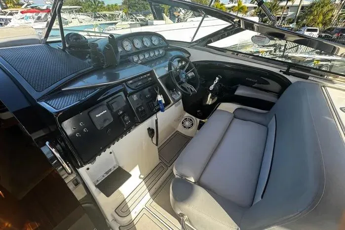 Slide: The Image of 2005 Cobalt 360 Cruiser cockpit with modern controls and comfortable seating. - 8