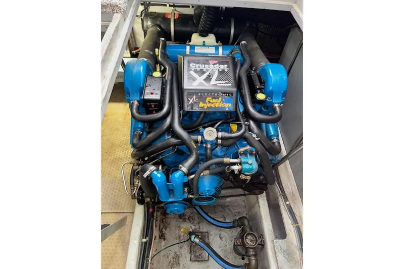 Slide: The Image of Engine compartment of a 1996 Silverton 442 Cockpit Motor Yacht with Crusader XL fuel injection. - 27