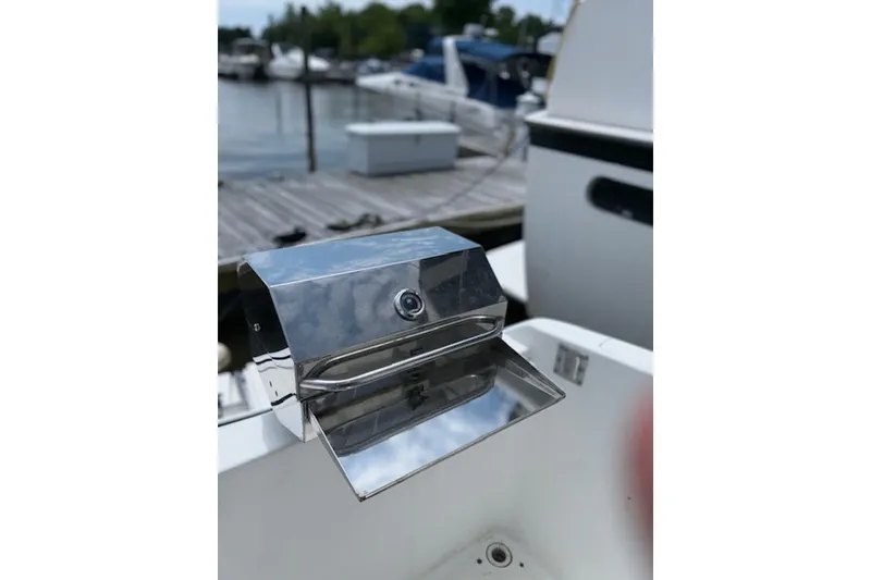 Slide: The Image of Stainless steel grill on 1996 Silverton 442 Cockpit Motor Yacht, docked at marina. - 3