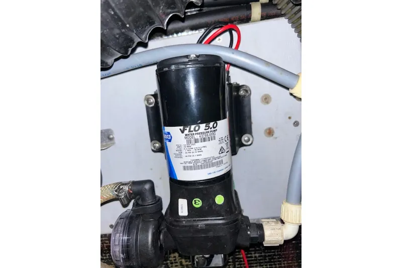 Slide: The Image of Water pressure pump in 1996 Silverton 442 Cockpit Motor Yacht engine room. - 33