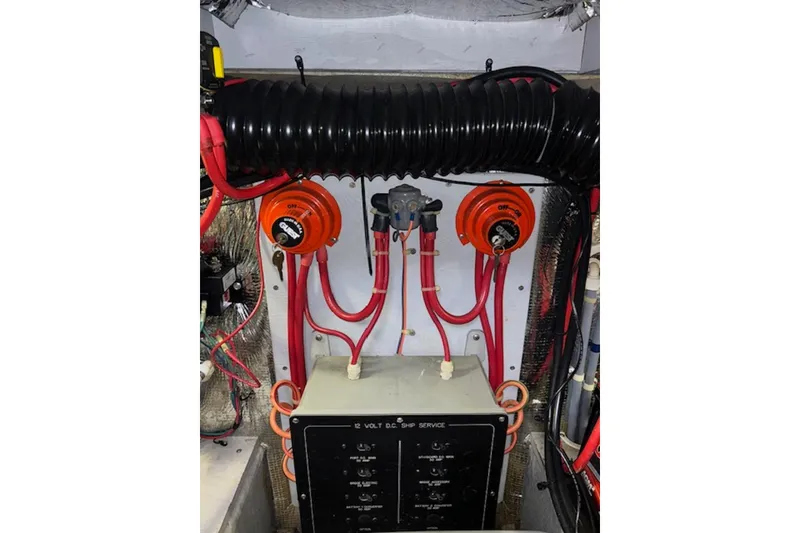 Slide: The Image of Electrical panel and wiring inside a 1996 Silverton 442 Cockpit Motor Yacht. - 36