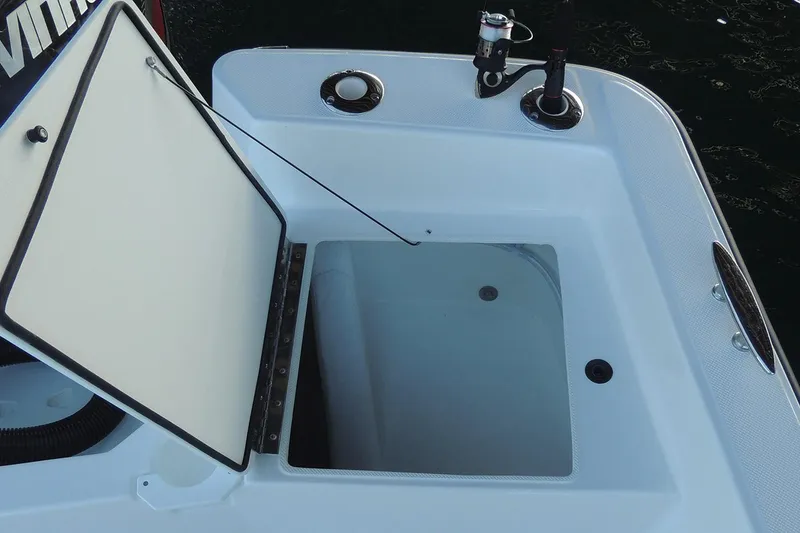 Slide: The Image of Manufacturer Provided Image: Open storage compartment on 2026 Maritime 189 Defiant boat. - 14