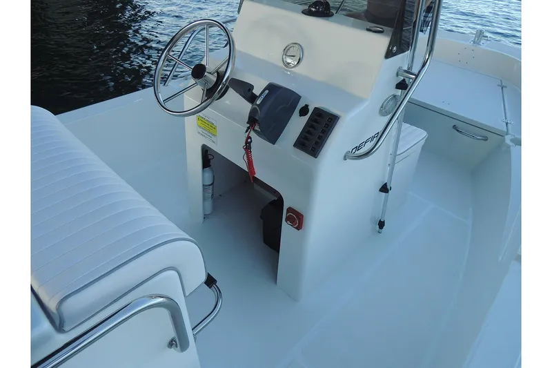 Slide: The Image of Manufacturer Provided Image: Interior view of the 2026 Maritime 189 Defiant boat. - 9