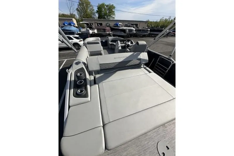 Slide: The Image of 2022 Bennington 22 L pontoon boat with spacious seating and modern design. - 17