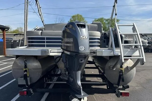 Slide: The Image of 2022 Bennington 22 L pontoon boat with Yamaha 50 HP outboard motor. - 4