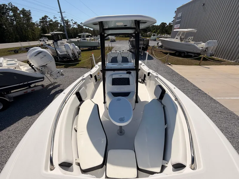 Slide: The Image of Interior view of a 2022 Tidewater 220 LXF boat outdoors. - 10