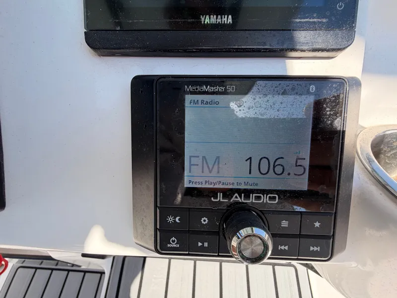 Slide: The Image of JL Audio MediaMaster 50 on Tidewater 220 LXF boat, FM 106.5. - 18