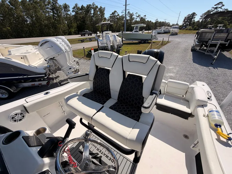 Slide: The Image of Interior view of a 2022 Tidewater 220 LXF boat with luxurious seating. - 20