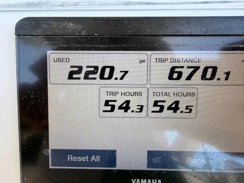 Slide: The Image of Tidewater 220 LXF 2022 boat display showing fuel and trip data. - 21