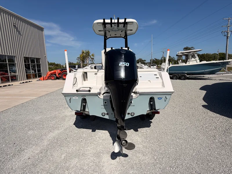 Slide: The Image of Rear view of a 2022 Tidewater 220 LXF boat with outboard motor. - 3